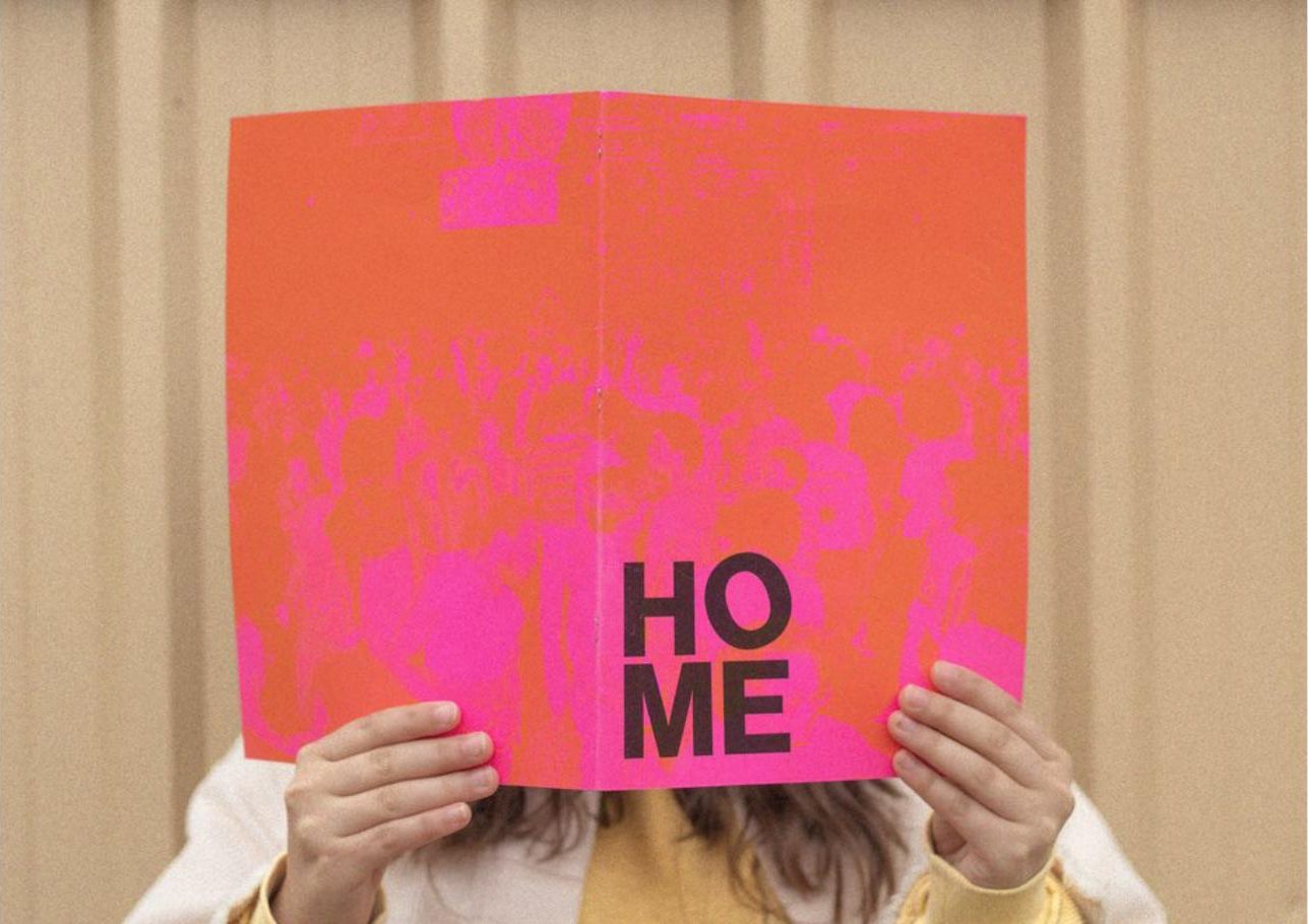 HOME zine held open